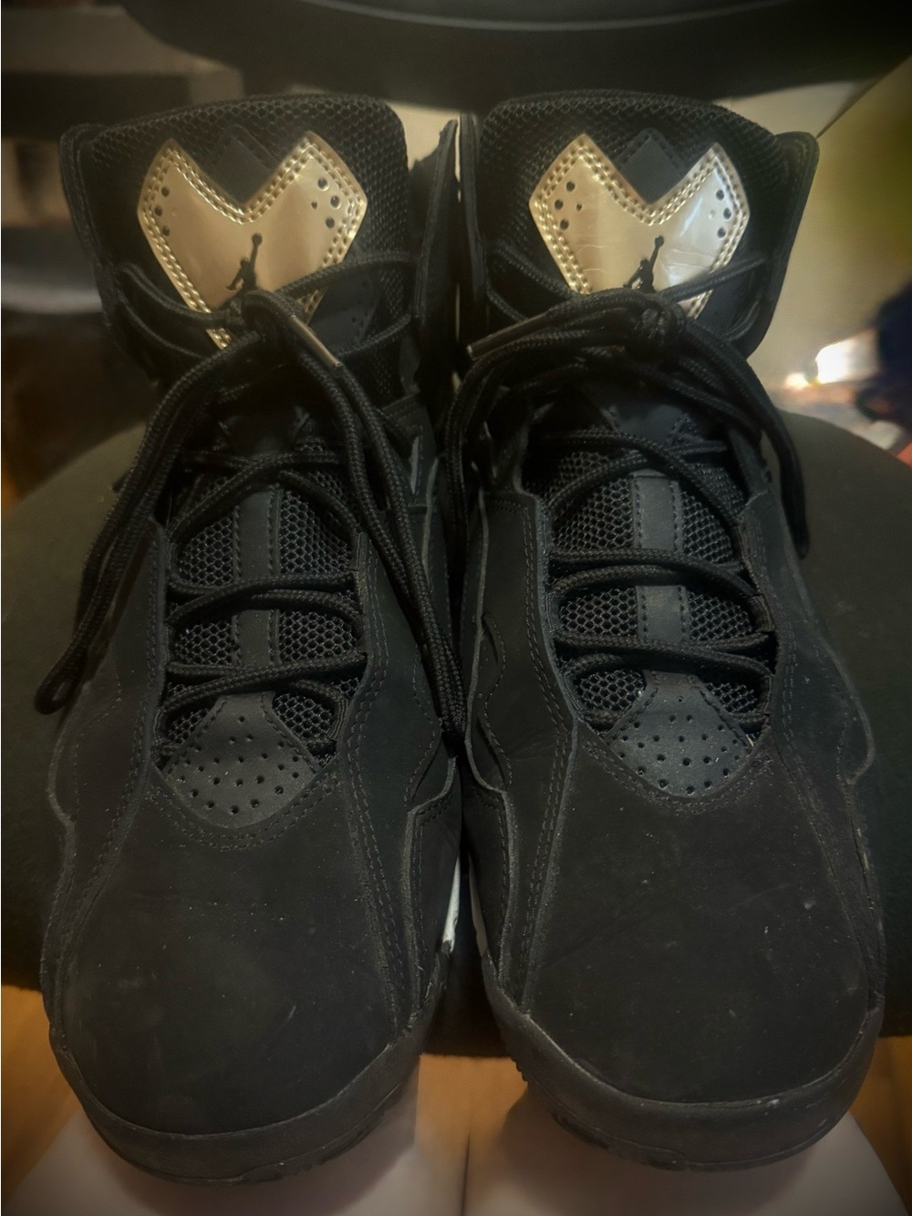 Jordan Black and Gold High-Top Sneakers